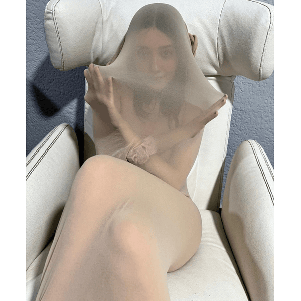 Front view of bxbiegem in a beige color encasement bodystocking.