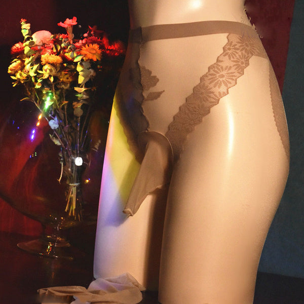 Front view of beige men's sheer pantyhose with floral lace panty section and nylon penis sheath.